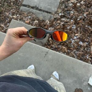 Stylish Sunglasses with Red Lenses